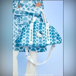 HELLO KITTY AND FRIENDS X FOREVER 21 COLLECTION ALLOVER HEART PRINT DUFFLE NWT